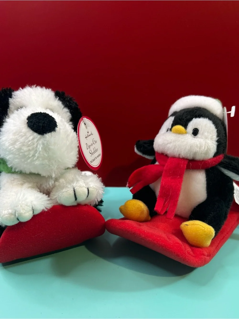 Hallmark Black & White Penguin with Red Scarf Plush Sledder